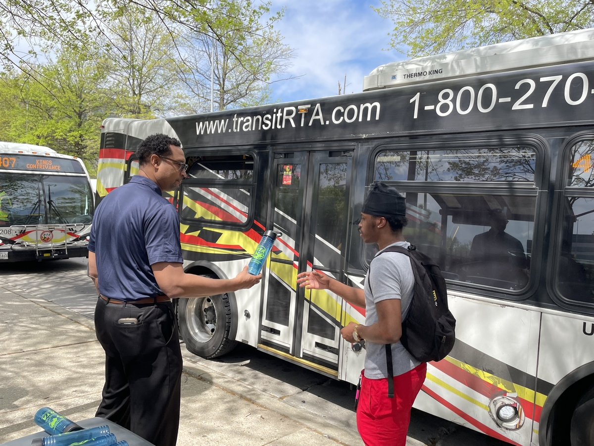 Thanking a customer at Earth Day pop up