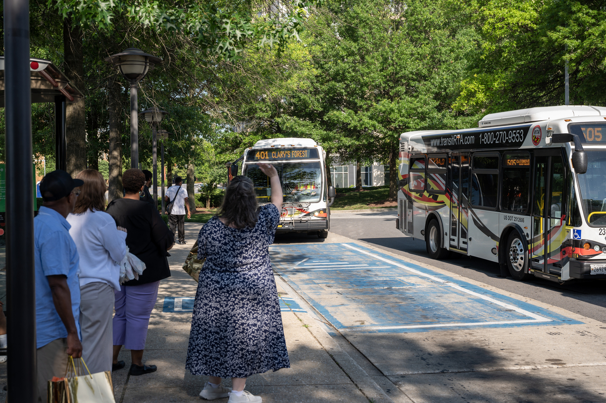 Waving to Approaching Bus
