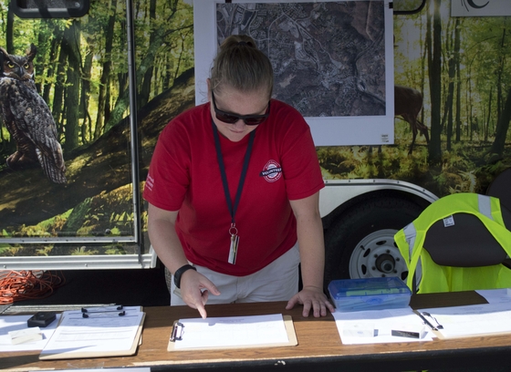 An Emergency Volunteer coordinator looking at planning sheets.
